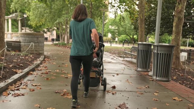 Caregivers balancing childcare and mobile usage outdoors, Individuals supervising children while engaging with mobile phones during outdoor activities in various weather conditions