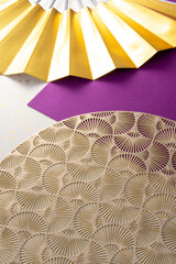 金色の扇子と和風の敷物のイメージ