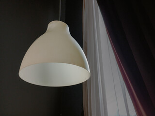 white pendant light in the bedroom