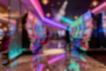 Blur image of slot machines in a casino.