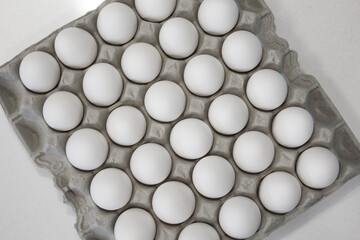 
A carton of white eggs