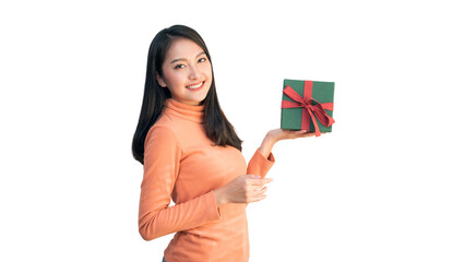Happy Asian woman holding red shopping bags and gift box for Christmas and New Year holiday shopping.