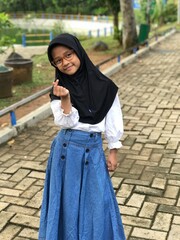 Portrait of a Hijabi Girl Wearing Glasses and Posing Naturally