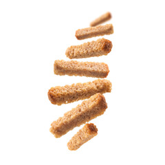 Bread croutons levitate on a white background
