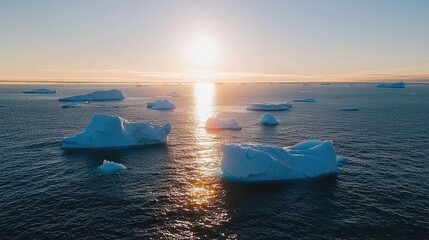 Serene sunset over icebergs arctic ocean aerial photography natural beauty tranquil environment scenic view