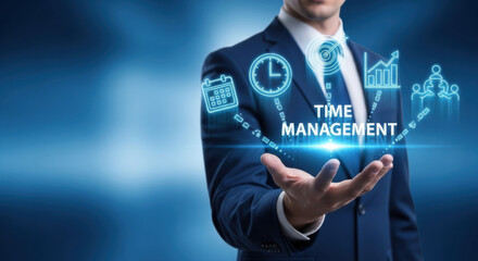A businessman in a blue suit presents a time management hologram, featuring icons like clocks and graphs, against a blue studio backdrop. Focused on business concepts.