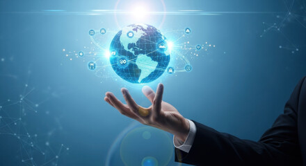 An executive in suit presenting digital earth globe with particle network. Concept for technology, globalization, networking, data and future business.