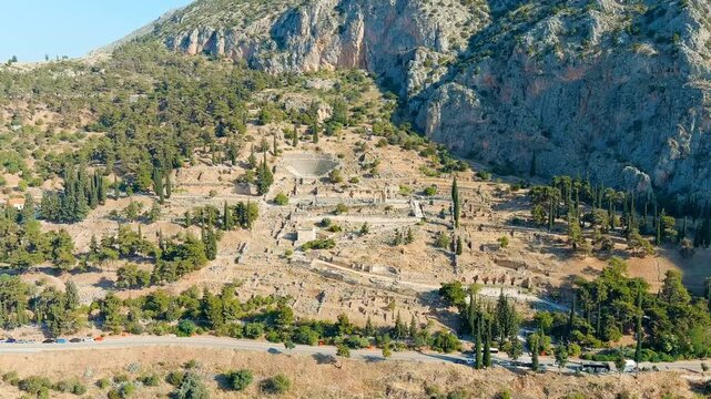 Delphi, Greece. Ruins of the ancient city of Delphi. Sunny weather in the morning, Summer. Drone footage
