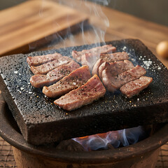 Delicious Grilled Meat on Stone Plate with Smoke Effect