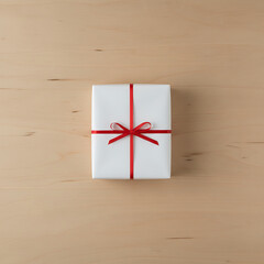 Minimalist White Gift Box with Red Ribbon on Wood Background