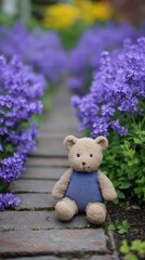A cute teddy bear sits on a stone path surrounded by vibrant purple flowers, creating a charming and serene garden scene.