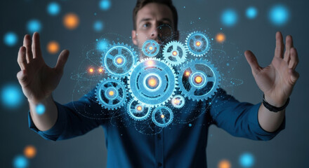 A man in a blue shirt interacts with a holographic display of gears, showcasing digital technology and engineering concepts on a gray gradient backdrop.