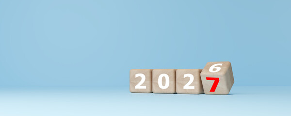 2027 New Year Transition and Future Planning Concept with Rolling Wooden Dice