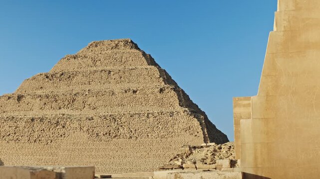This image captures the iconic Step Pyramid of Djoser, a monumental structure in the Saqqara necropolis, Egypt.