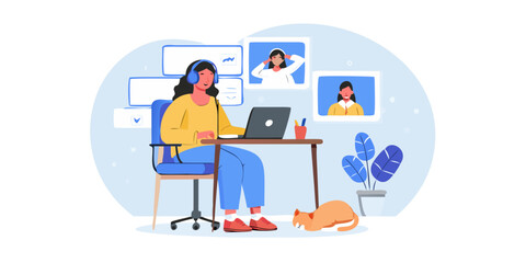 Woman participating in a video conference call while working from home