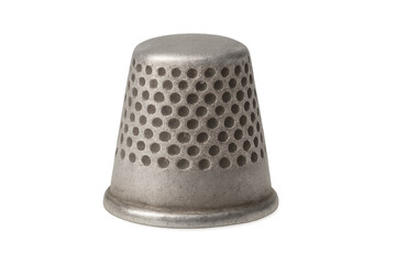 Old metal thimble used for sewing and needlecraft