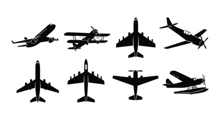 Collection of various airplane silhouettes including biplanes and modern jets © nurjahan