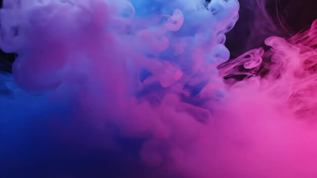 Colorful Smoke Cloud - A mesmerizing cloud of blue and pink smoke fills the frame against a dark background, creating a sense of mystery and beauty.