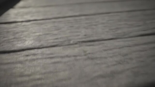 Close-up of gray wooden boards with visible grain and texture
