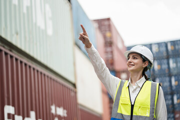 Portrait finger point Caucasian woman logistics workers at container site	