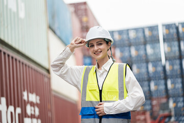 Portrait Caucasian woman logistics workers at container site	