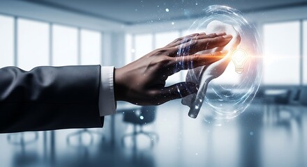 Hand in suit cleaning digital lightbulb glowing with ideas in office image