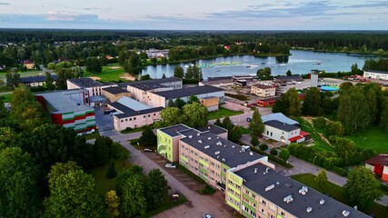Aerial view of wakeboarding cable park on Ozolnieki Lake in summer evening in Latvia
