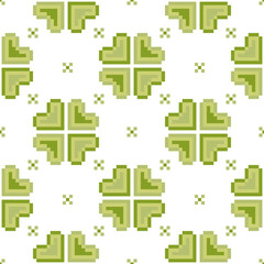Obraz premium Clover leaves seamless pattern.Lucky magical plant. Background for St.Patrick's Day.Cute green shamrock four leaf. Irish Celtic folk.Pixel embroidery,ethnic,cross stitch style.Vector illustration.