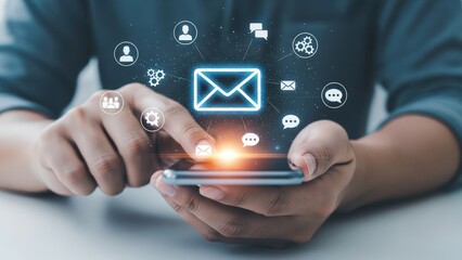 Person interacting with mobile email marketing and digital communication icons