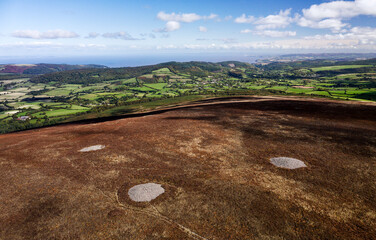 Dunkerry Hill, Exmoor, Somerset. Bronze Age burial mound cairns including  Joaney How (R) and Robin How (mid) near Dunkerry Beacon. View to NE