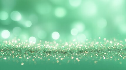 Obraz premium Beautiful teal background with shimmering golden bokeh lights creating an elegant and mesmerizing abstract pattern for design projects and creative presentations