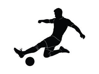 Silhouette of a football player kicking a ball during a match