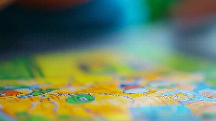 selective focus baby’s hand on children’s educational book