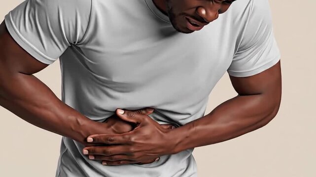 Man Experiencing Severe Abdominal Pain And Discomfort, Health Problem and Distress