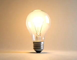 Close-up of a glowing, classic incandescent light bulb (1)