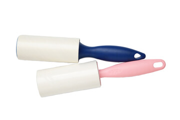 Cloth fabrics cleaner lint roller brush with paper roll isolated on white background. Sticky roller, pet cat dog fur dust hair remover
