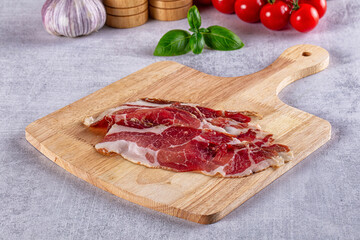 Cured pork Spanish jamon slices