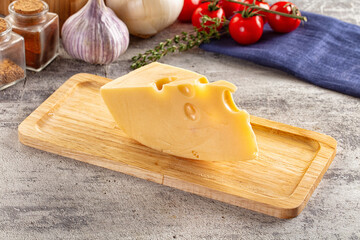 Yellow maasdam cheese triangle piece