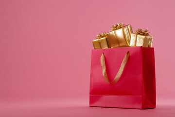 Red shopping bag for shopping with gold gift boxes.