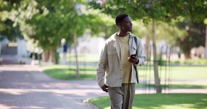Student, man and walking with phone at college for semester start, explore campus and learning. Education, black person and smartphone outdoor for university tour, scholarship opportunity and study