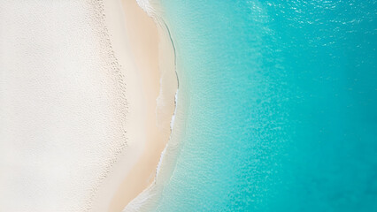Aerial view of a serene beach with turquoise water and white sand