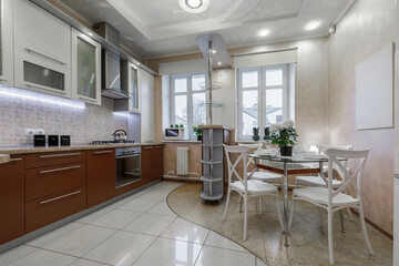Bright Modern Kitchen Interior with Dining Table and Cabinets