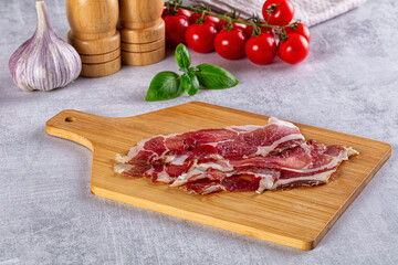 Cured pork Spanish jamon slices
