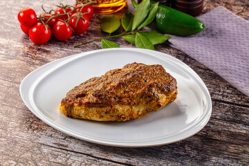 Baked chicken breast with spices and herbs