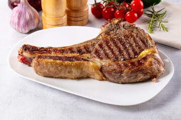 Grilled ribeye beef steak with bone
