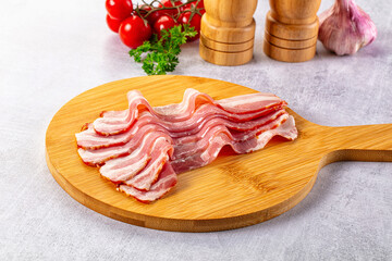 Raw bacon pork meat slices