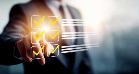 Businessman checking off a completed to-do list on a virtual screen. Concept of quality assurance,...