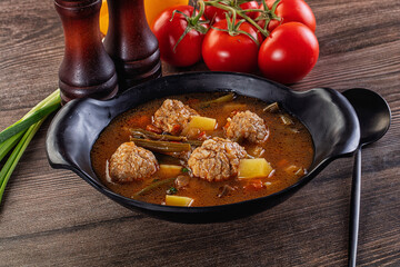 Tomato Soup with meatballs and vegetables