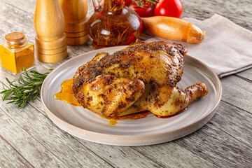 Baked in oven whole chicken with spices