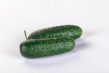 Ripe green raw two cucumbers